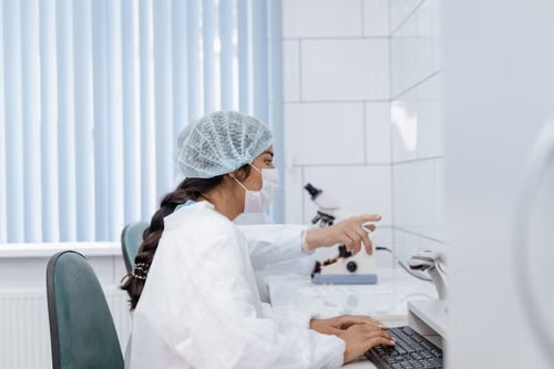 Public health researchers reviewing data in a laboratory setting